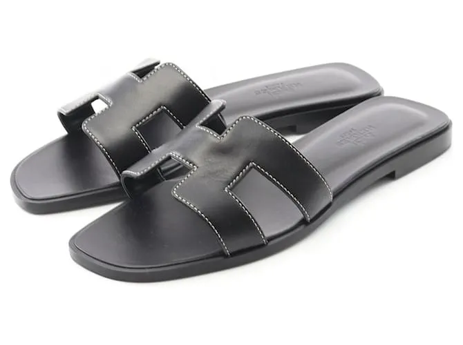 Mule Oran in Pelle Box di Hermès Nero