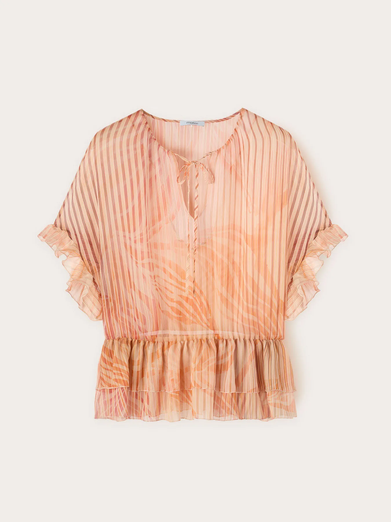 Blusa in fantasia con volant