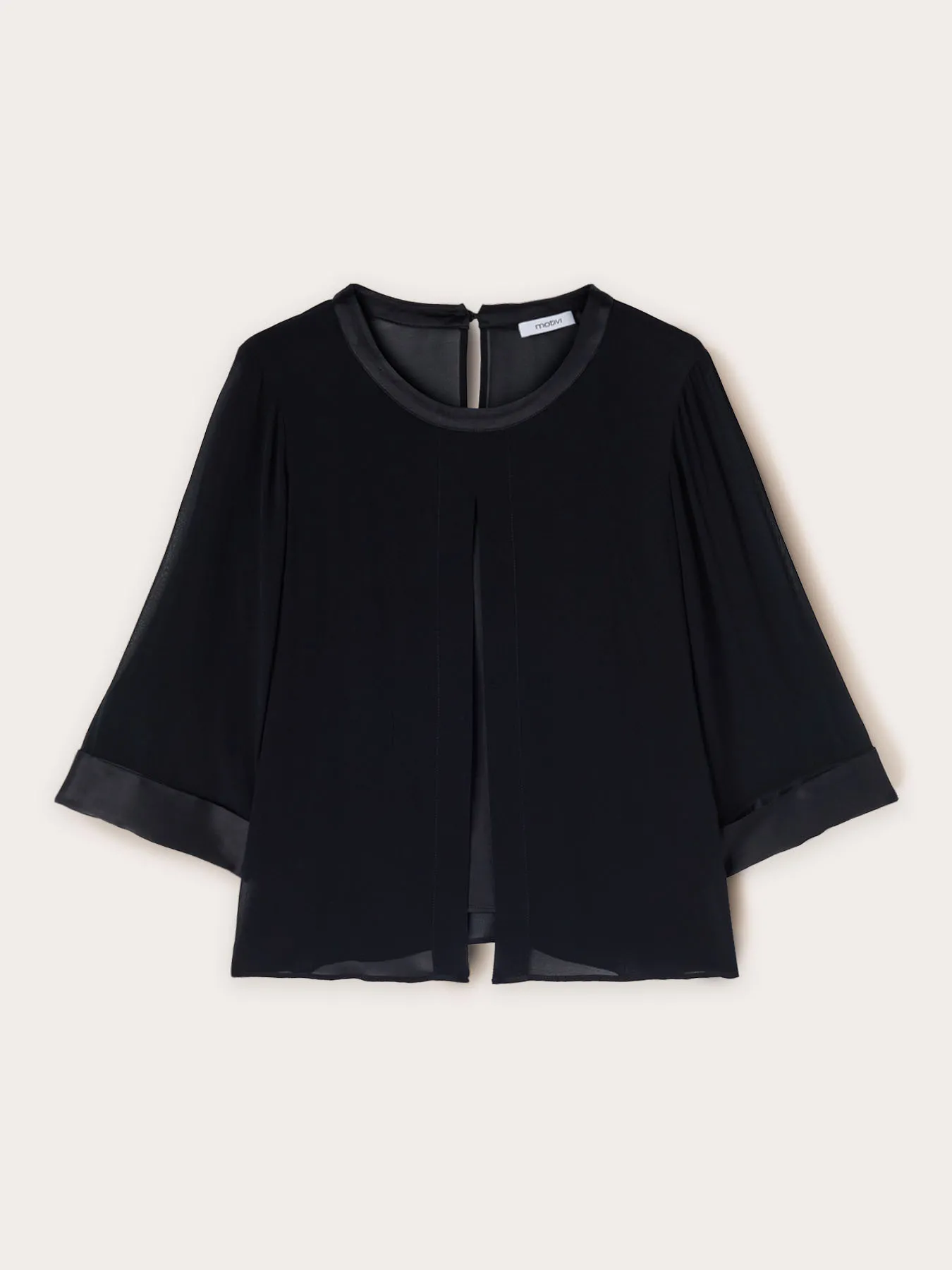 Blusa fluida bimaterica