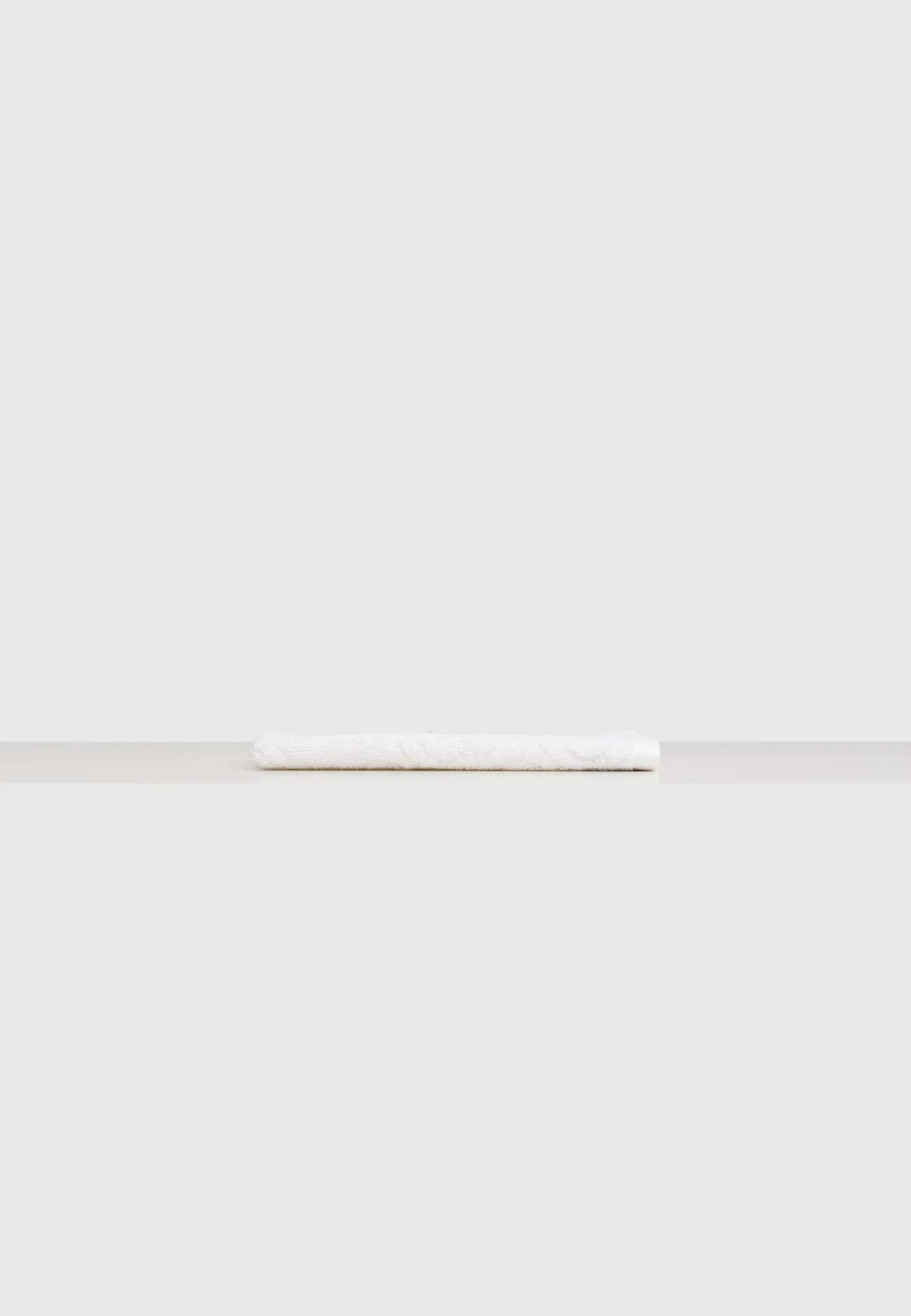 Asciugamano ospite a onde tinta unita Maisonette