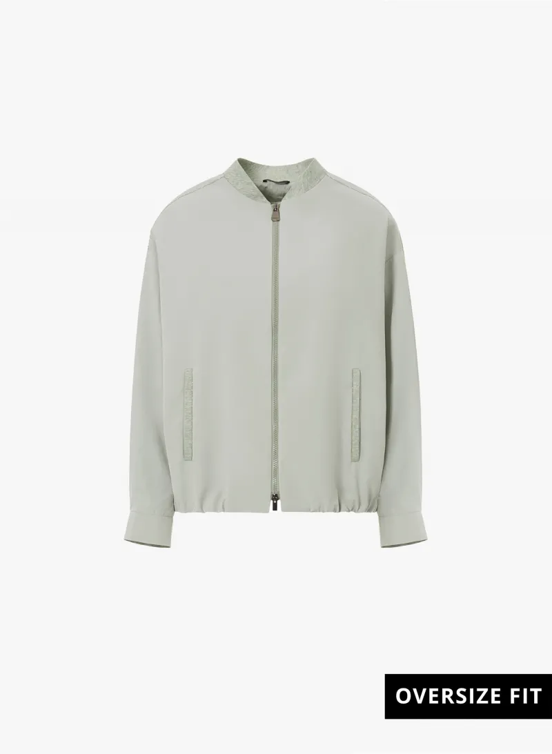 Bomber oversize grigio chiaro in tessuto tecnico antigoccia