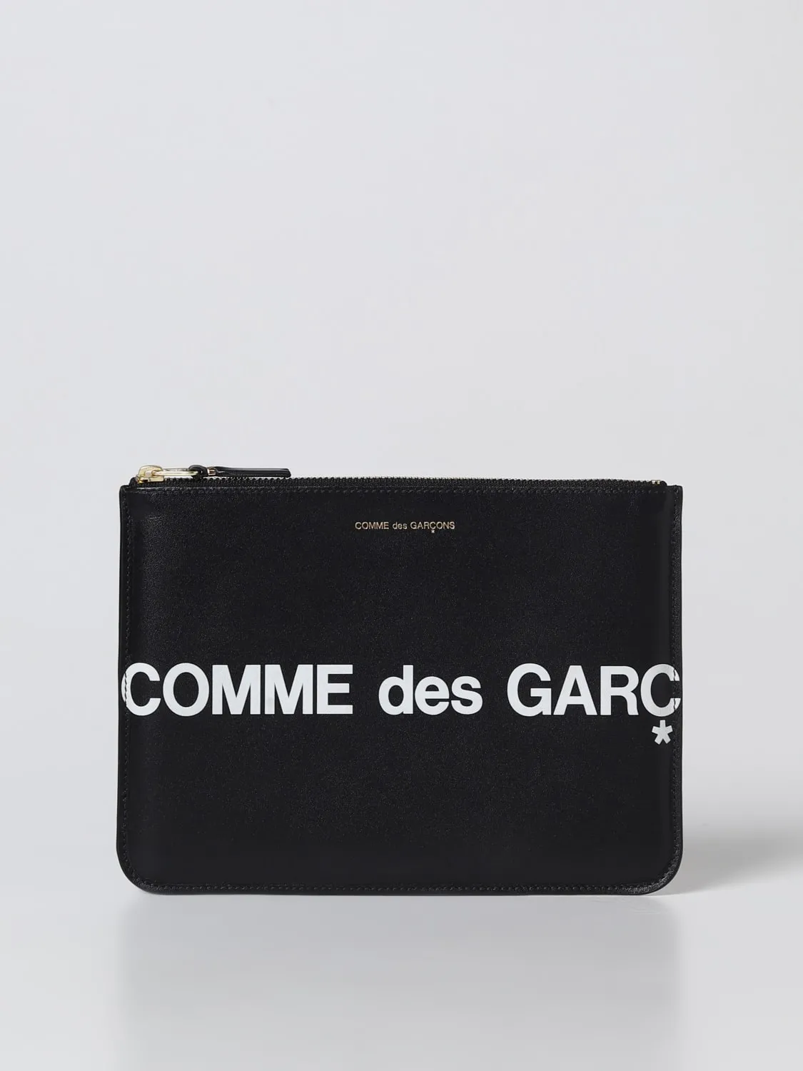 Pochette Comme Des Garçons in pelle