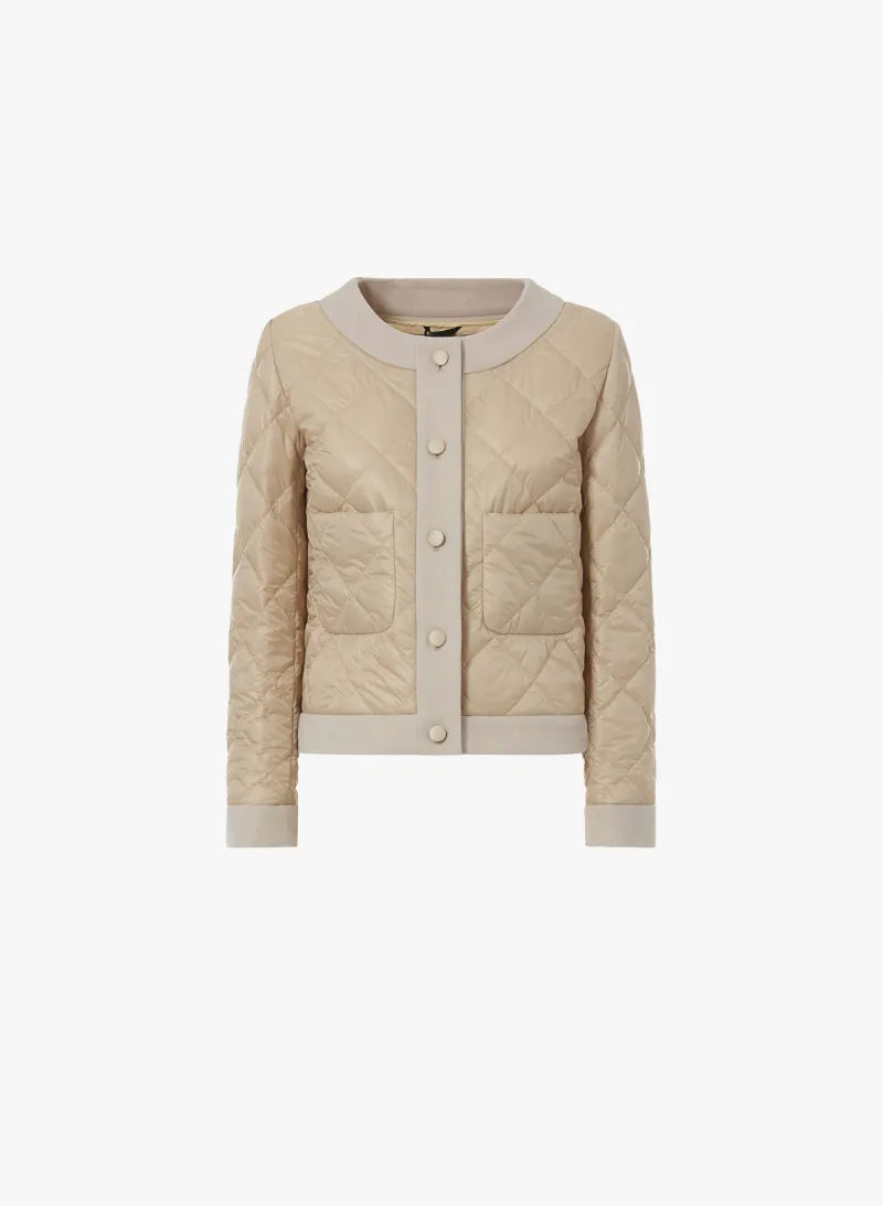 Giacca imbottita beige con dettagli in pura lana